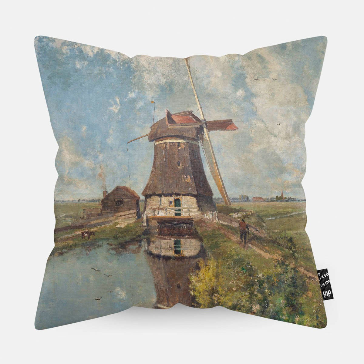 Kussen met schilderij van in de maand juli erop afgebeeld.