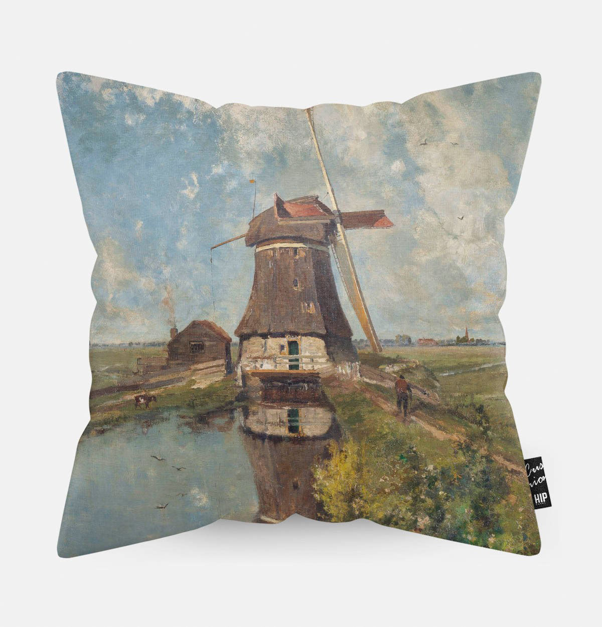 Kussen met schilderij van in de maand juli erop afgebeeld.