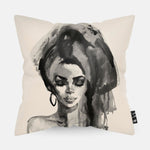 Beige kussen met een zwart wit vrouw erop