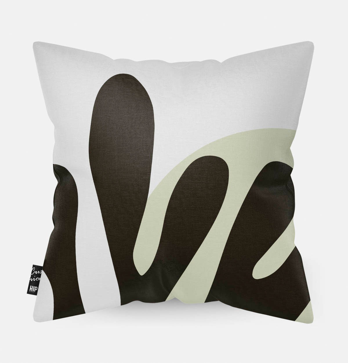 Kussen met line art met groen koraal erop afgebeeld in abstracte vorm.