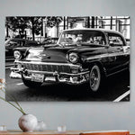 Vierkante wanddecoratie van een luxe auto in zwart-wit.
