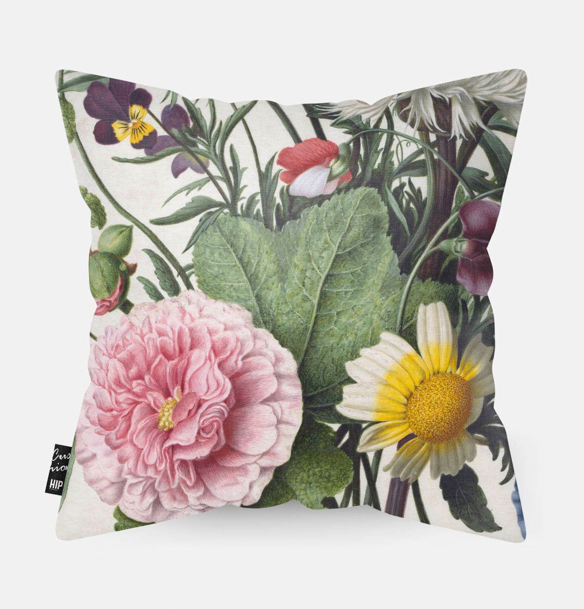 Kussen met schilderij van een boeket bloemen erop afgebeeld in detail.