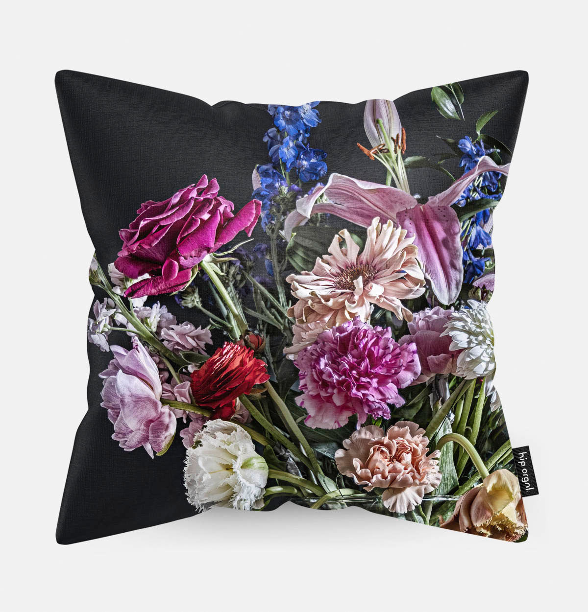 Sierkussen met kleurrijke bloemen in een glazen vaas