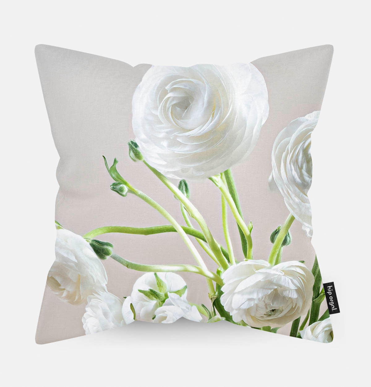 Sierkussen met witte bloemen met een lichte achtergrond