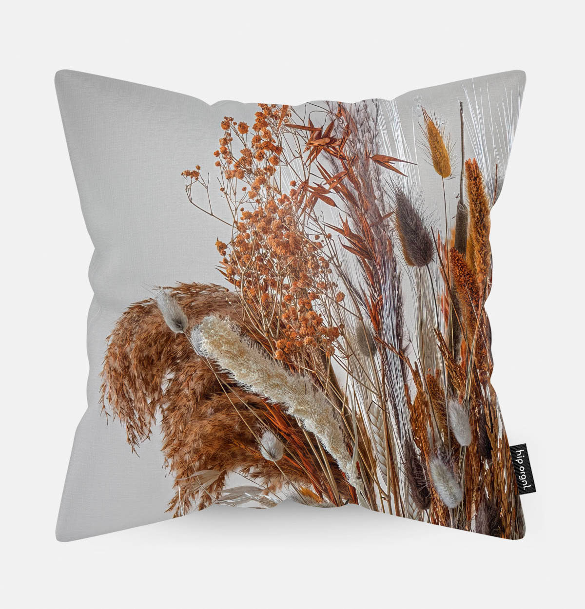 Sierkussen met droogbloemen met koper kleur