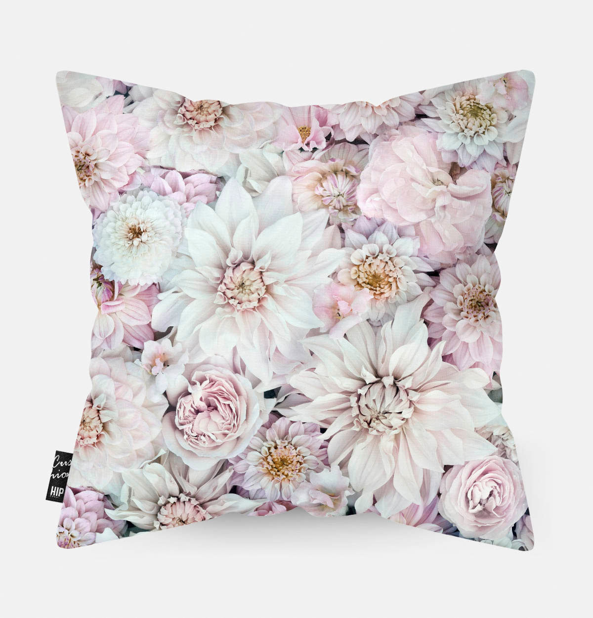 Kussen met Dahlias bloemen erop afgebeeld.