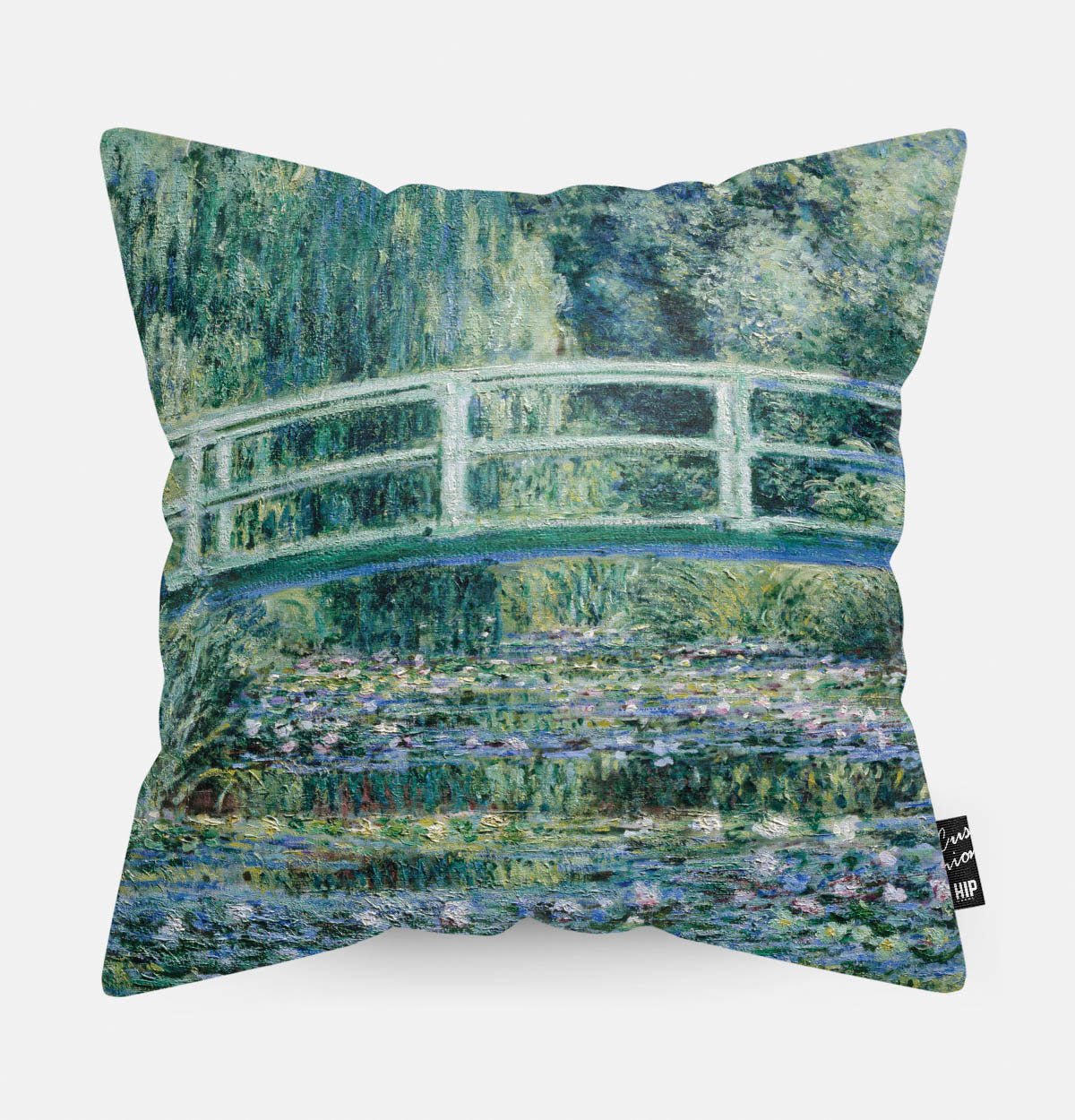 Kussen met schildering van Japanse brug en de waterlelies erop afgebeeld.