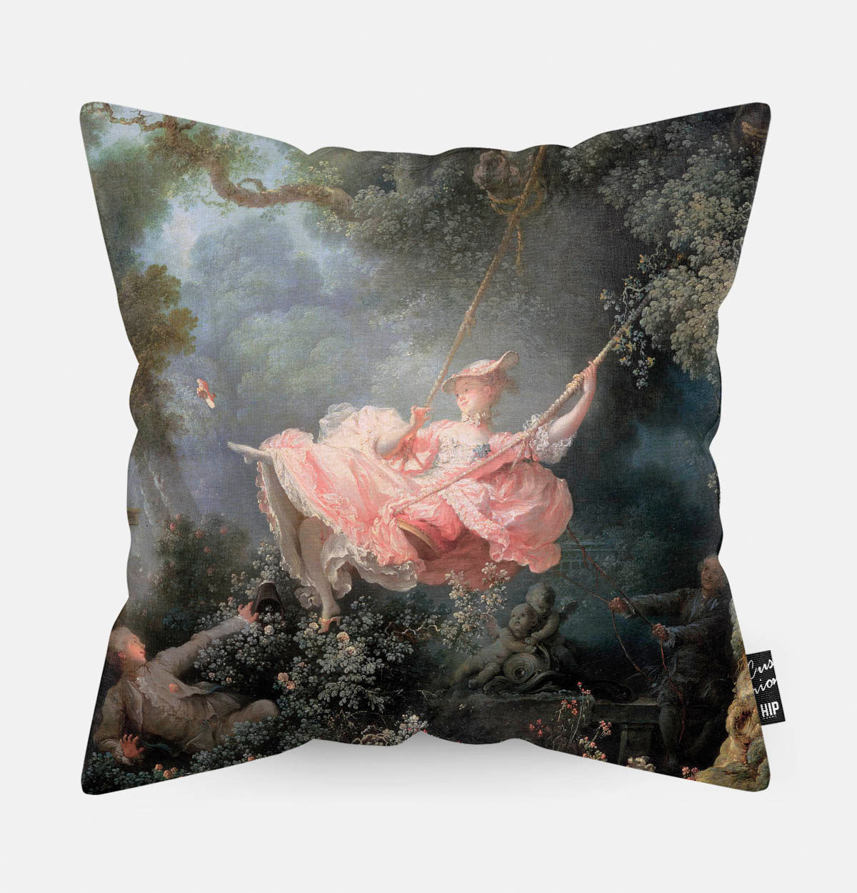 Kussen met schilderij van de schommel met een meisje in het roze erop afgebeeld.