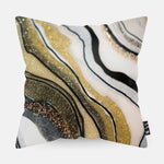 Kussen met gouden agate steen erop afgebeeld.