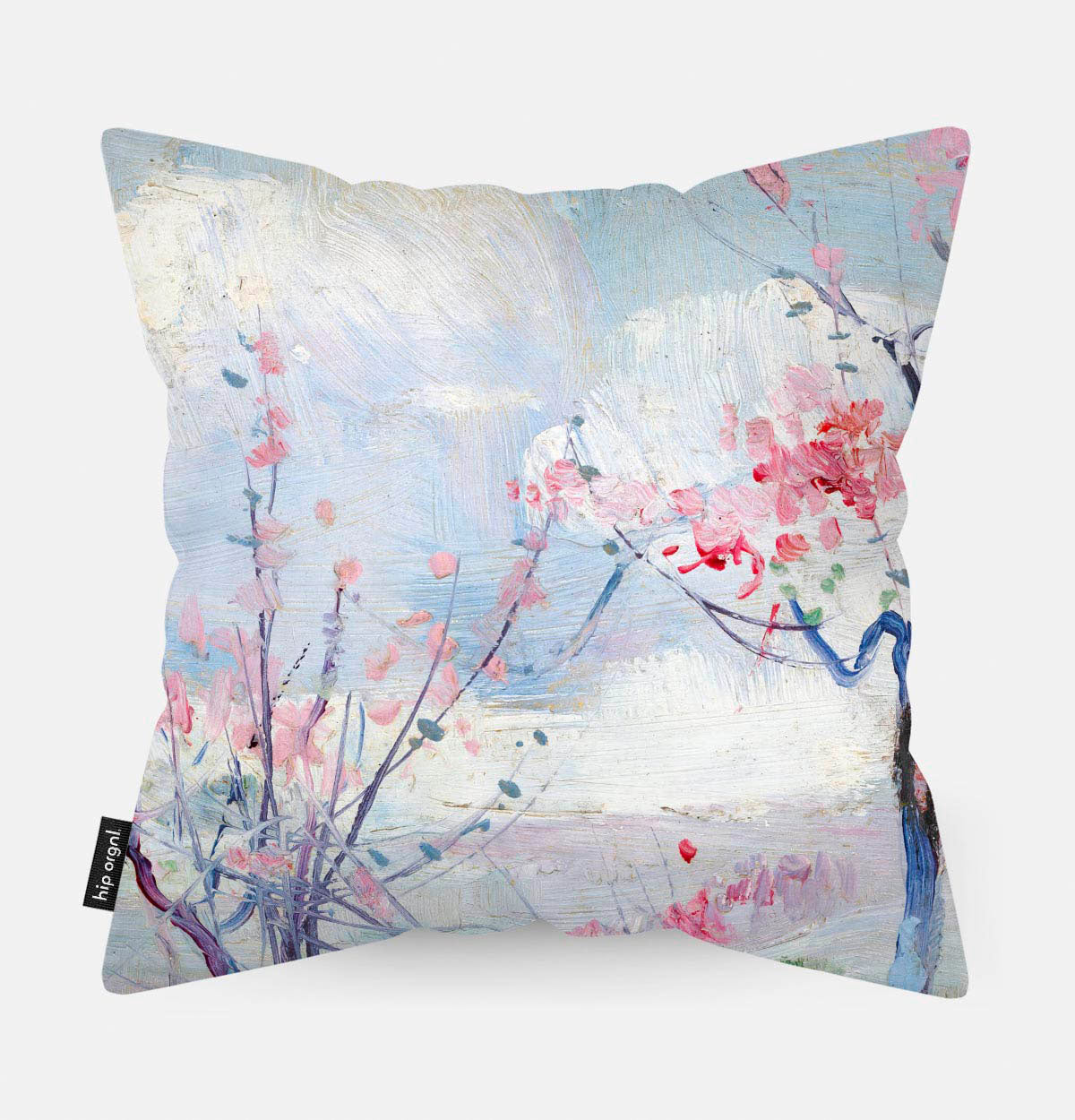 Achterzijde van een sierkussen blauw roze met bloesem erop