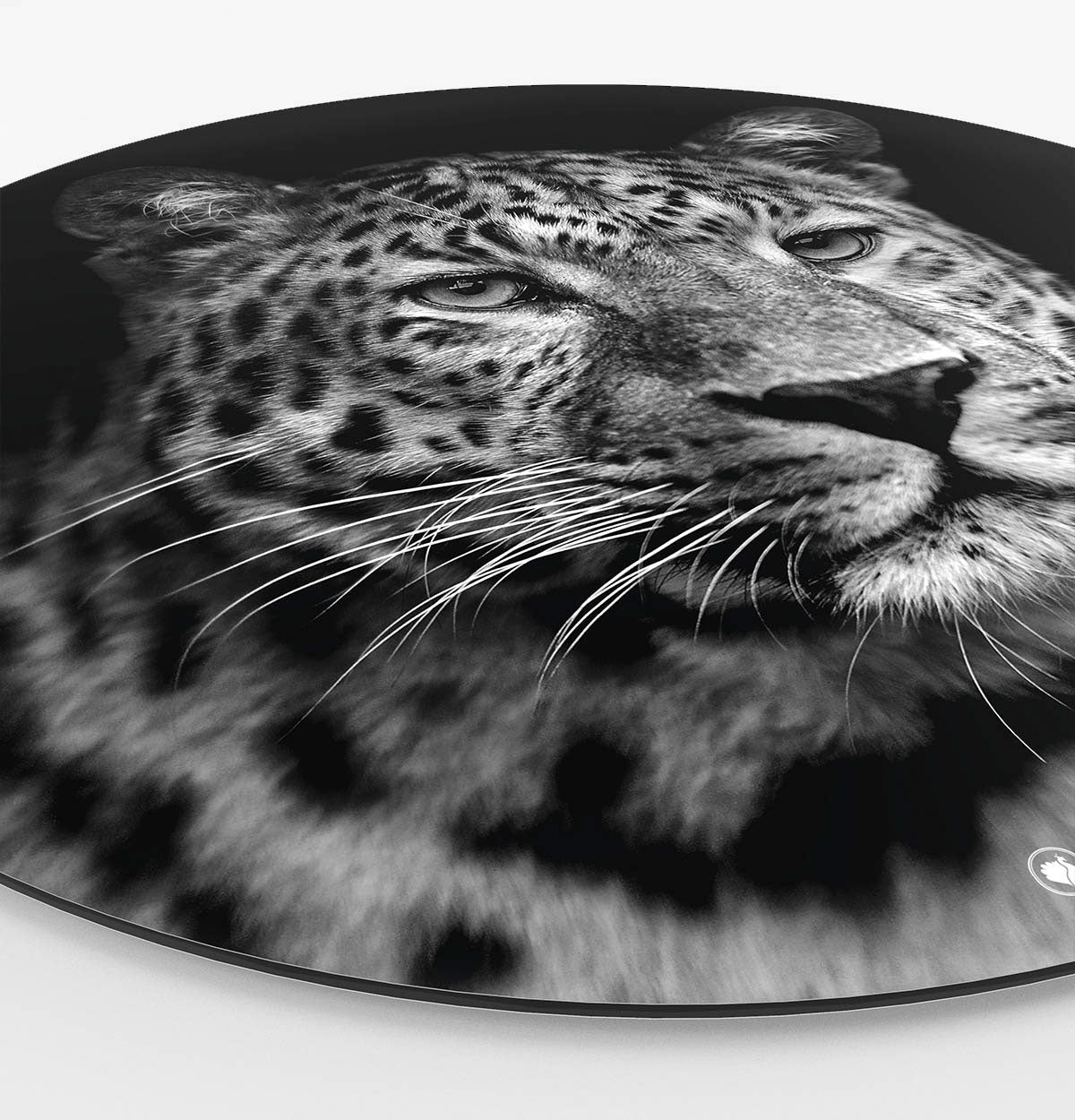 Wandcirkel met een luipaard in het zwart-wit erop Side