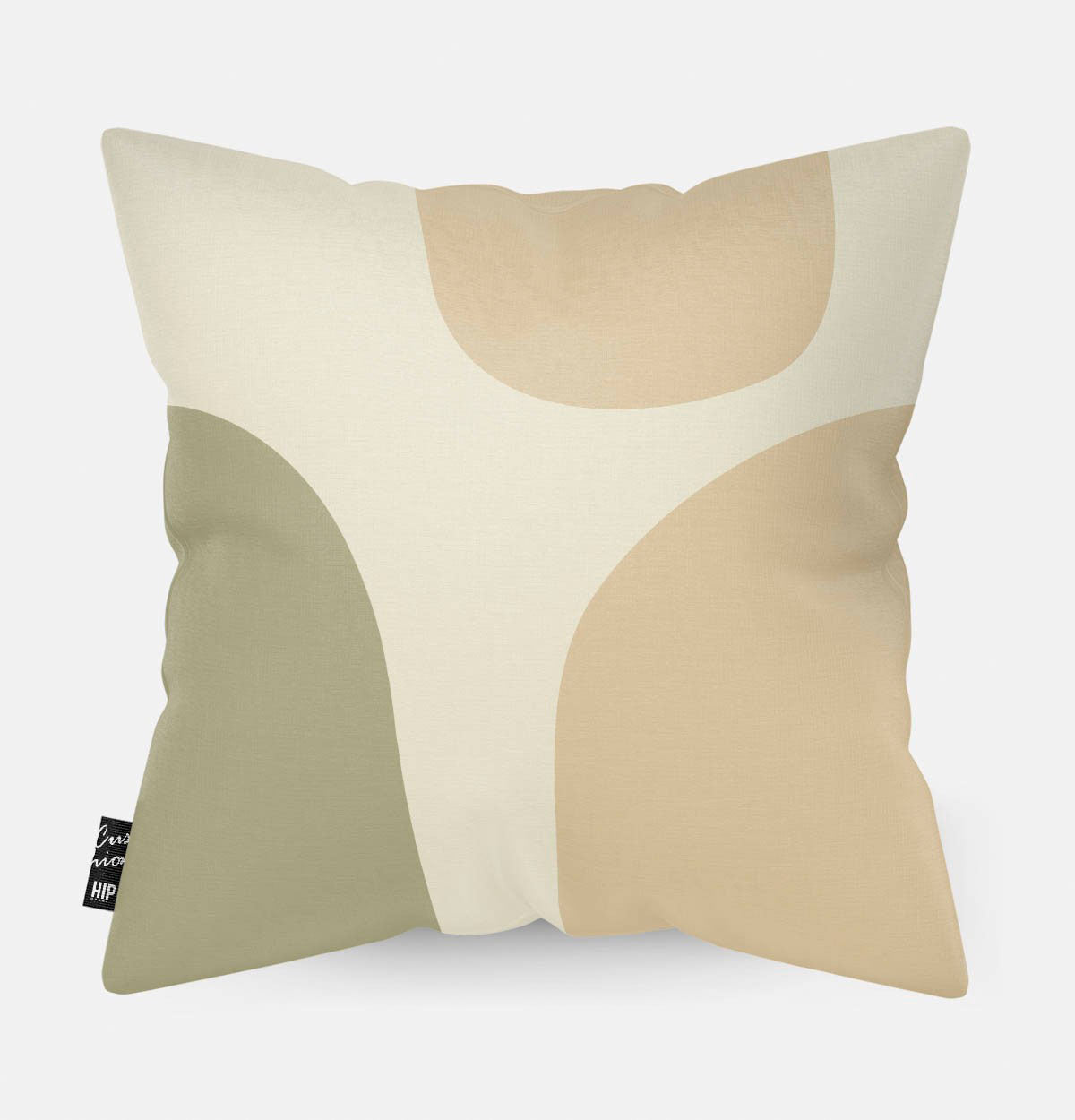 Kussen met verschillende vierkanten in verschillende kleuren erop.