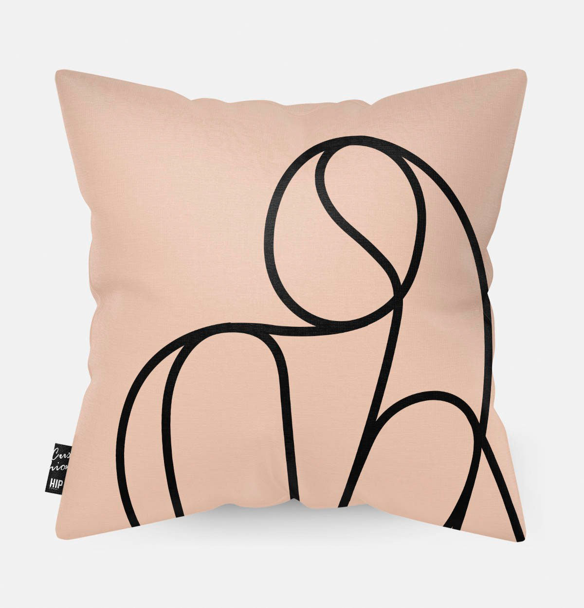Kussen met line art met vrouwenlichaam erop afgebeeld.