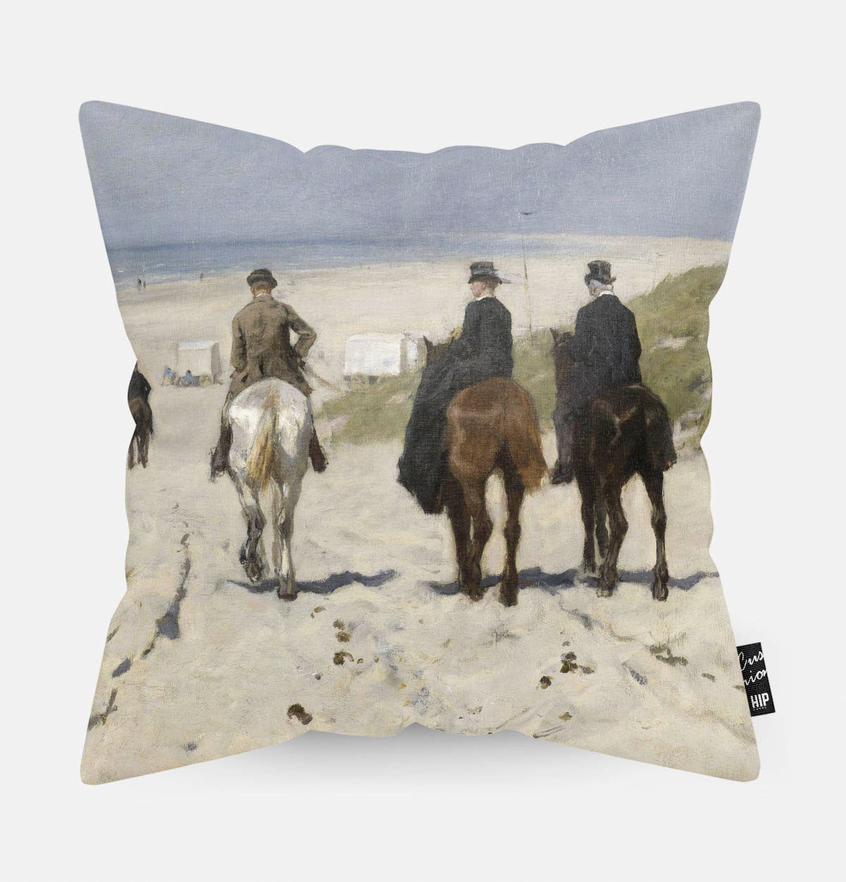 Kussen met schilderij van morgenrit langs het strand erop afgebeeld.
