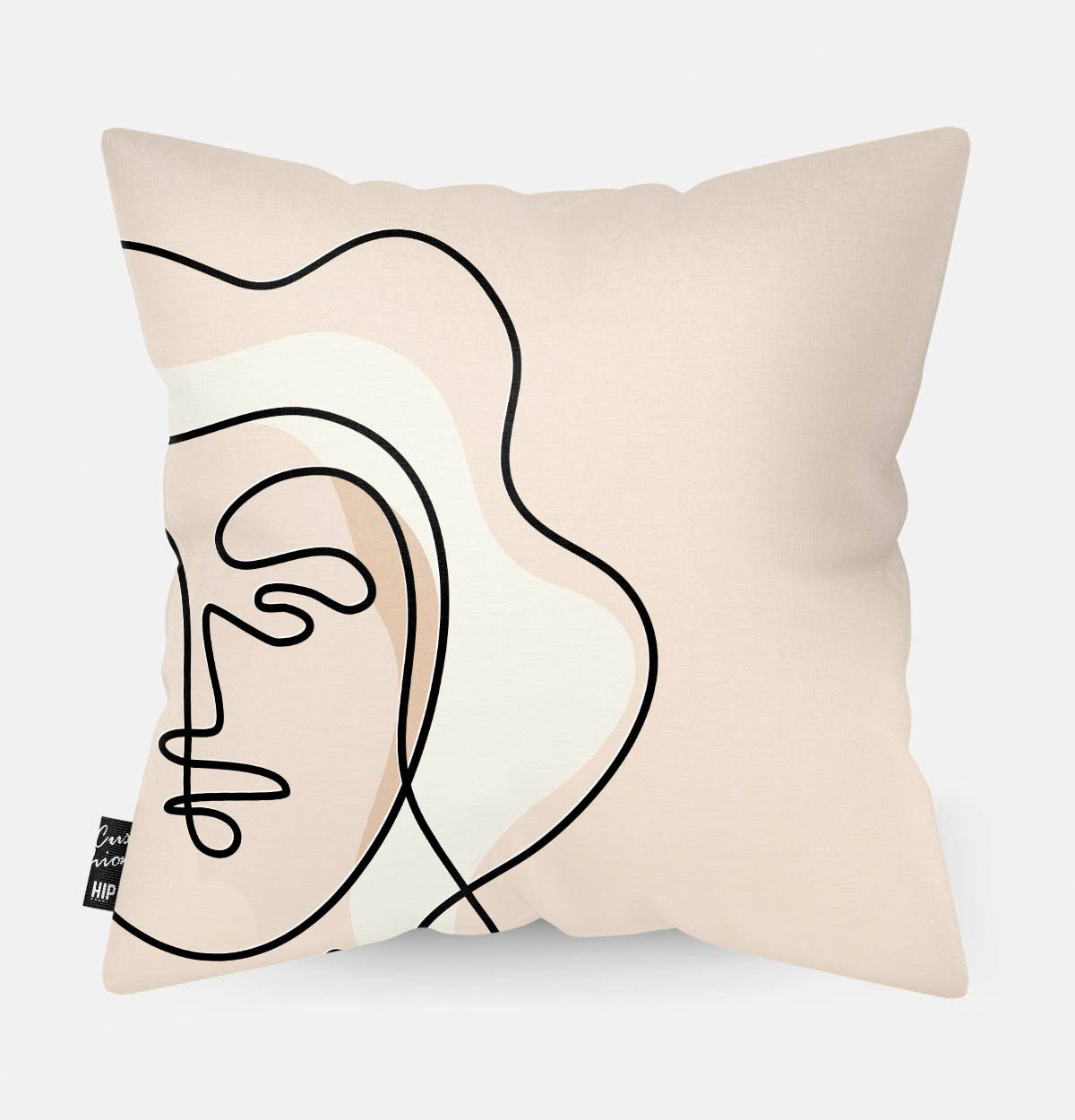 Kussen met line art van vrouwengezicht met krullen erop.