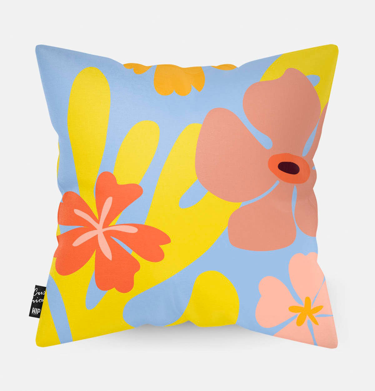Kussen met verschillende kleurrijke bloemen op een blauwe achtergrond van de bloemen erop.