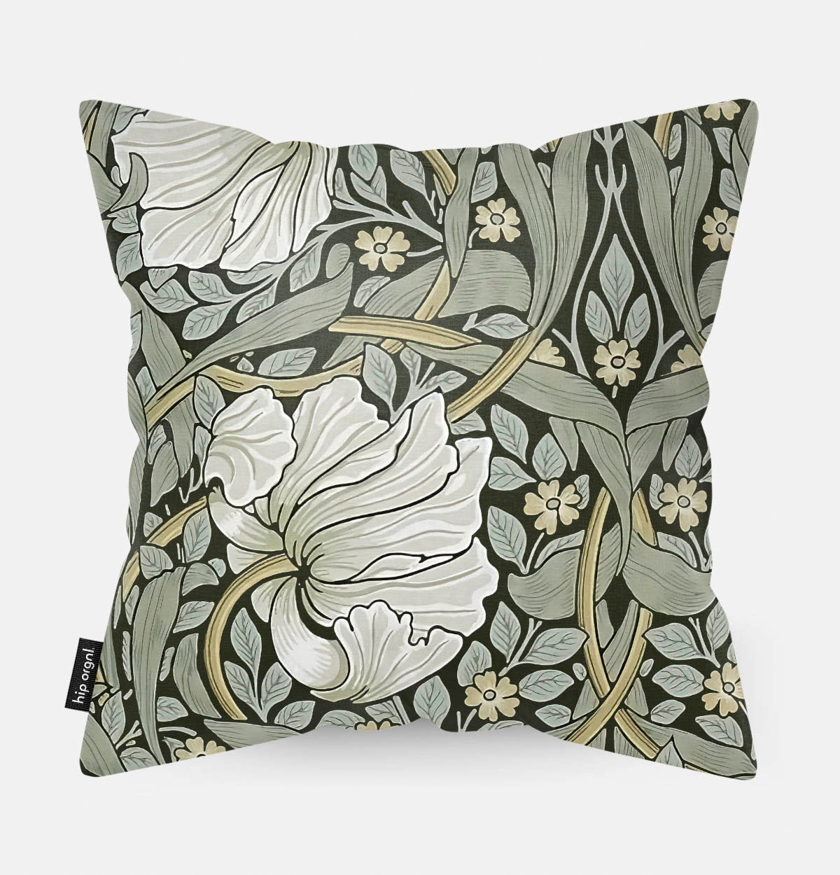Achterzijde van een sierkussen met een groen patroon met witte bloemen