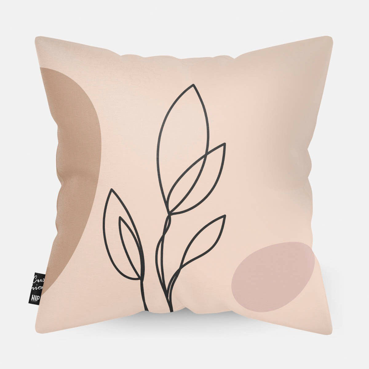 Kussen met line art van botanische plant erop.