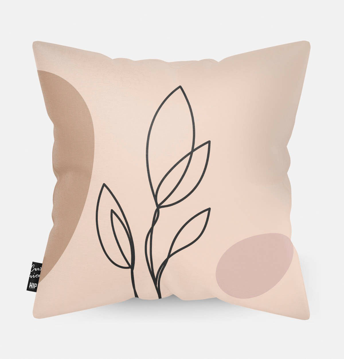 Kussen met line art van botanische plant erop.