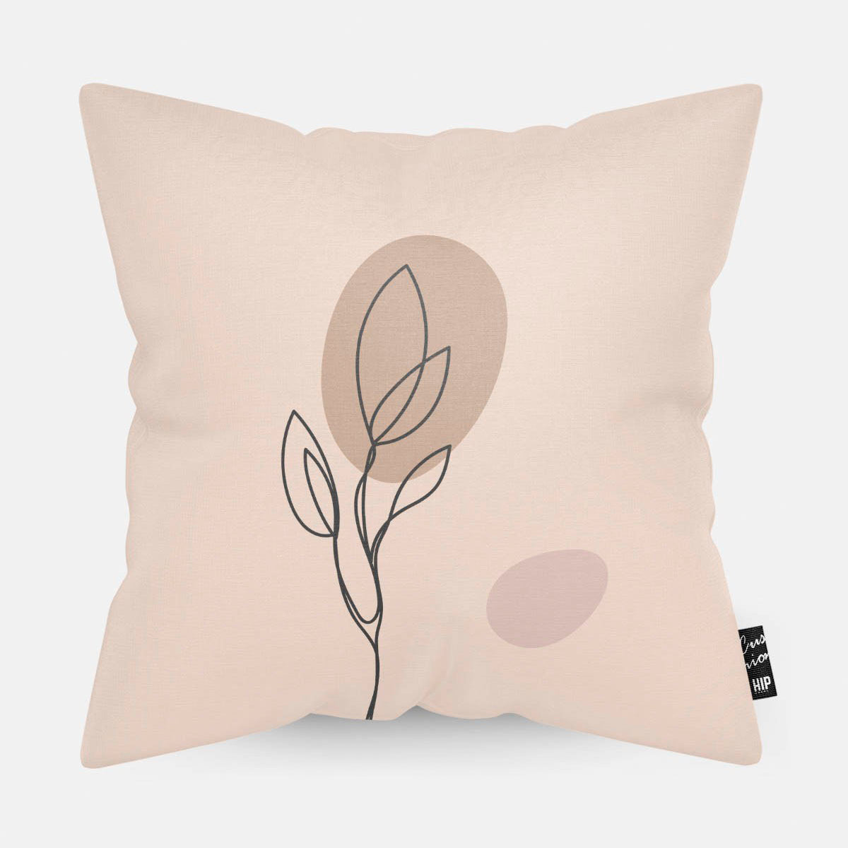 Kussen met line art van botanische plant erop.