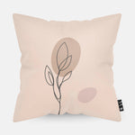 Kussen met line art van botanische plant erop.