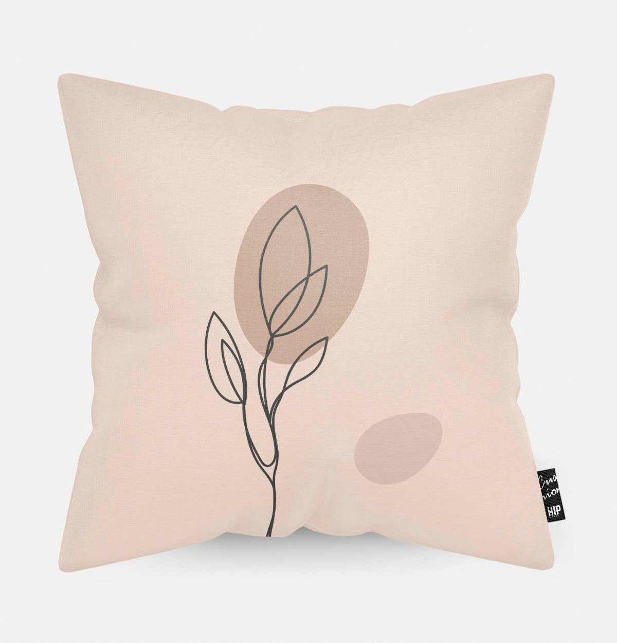 Kussen met line art van botanische plant erop.