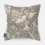 Sierkussen met een bloemen patroon en een beige bruine achtergrond kleur