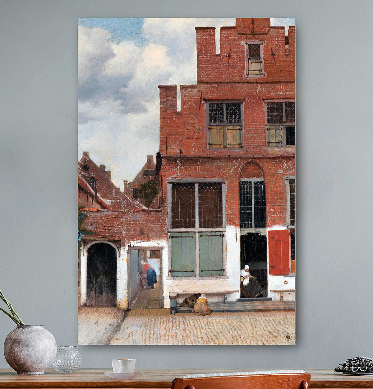 Vierkante wanddecoratie met het straatje erop.