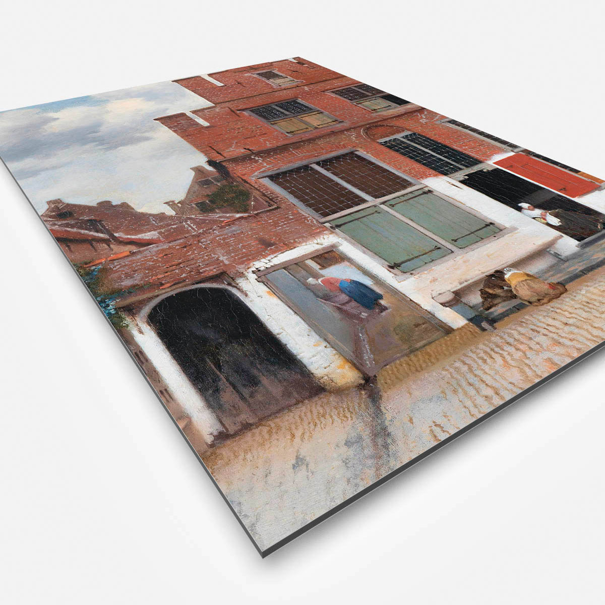 Vierkante wanddecoratie met het straatje erop.