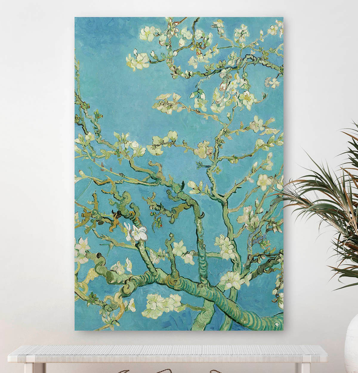 Vierkante wanddecoratie met schilderij Amandelbloesem erop.