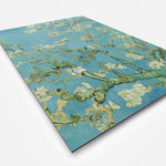 Vierkante wanddecoratie met schilderij Amandelbloesem erop.