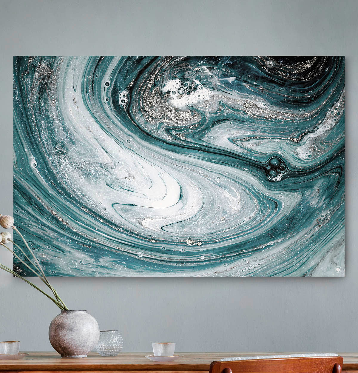 Vierkante wanddecoratie met draaikolk erop.