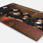 Vierkante wanddecoratie met schilderij van de staalmeesters erop.