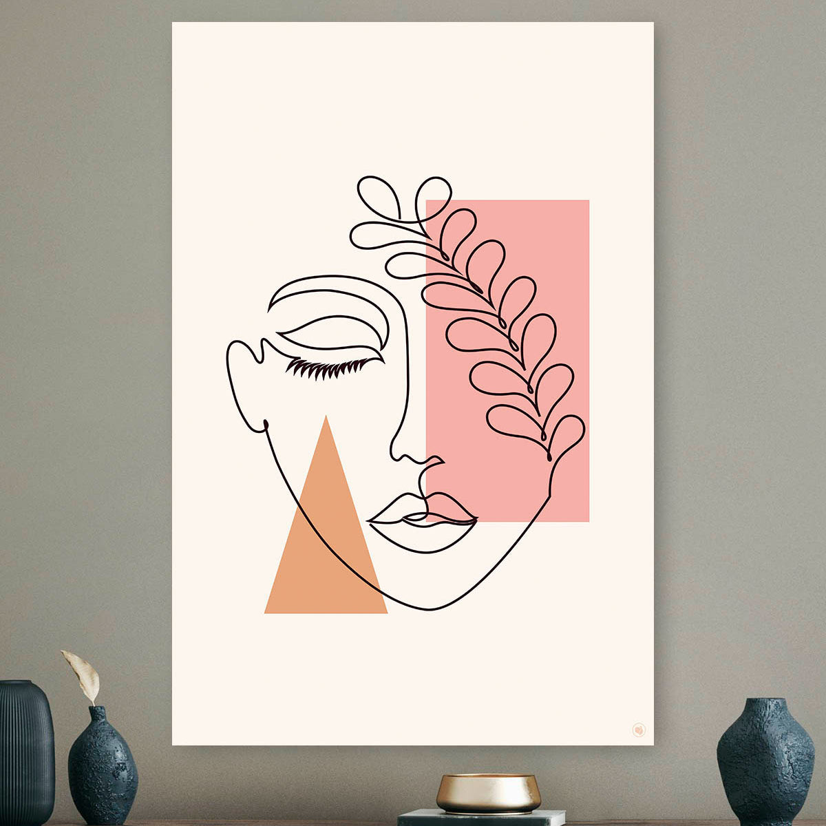 Vierkante wanddecoratie met gezicht met blad over oog in moderne kunst erop.
