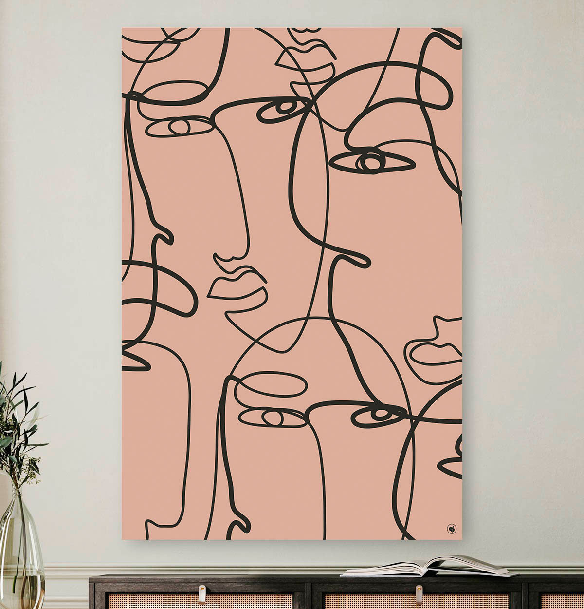 Vierkante wanddecoratie met meerdere gezichten in moderne kunst erop.