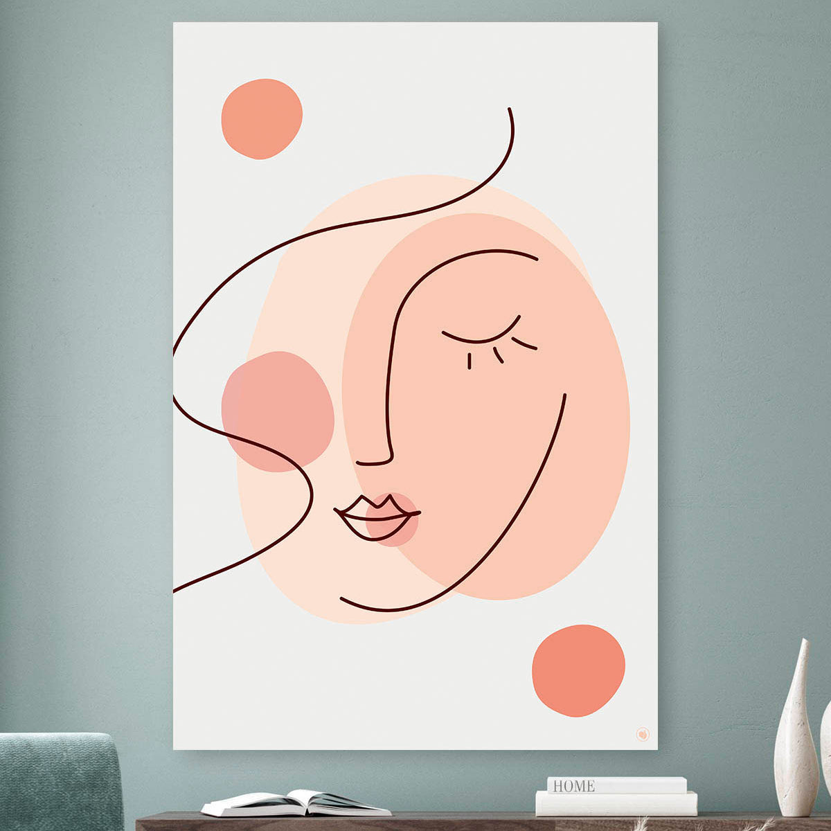 Vierkante wanddecoratie met gestyld gezicht in moderne kunst erop.