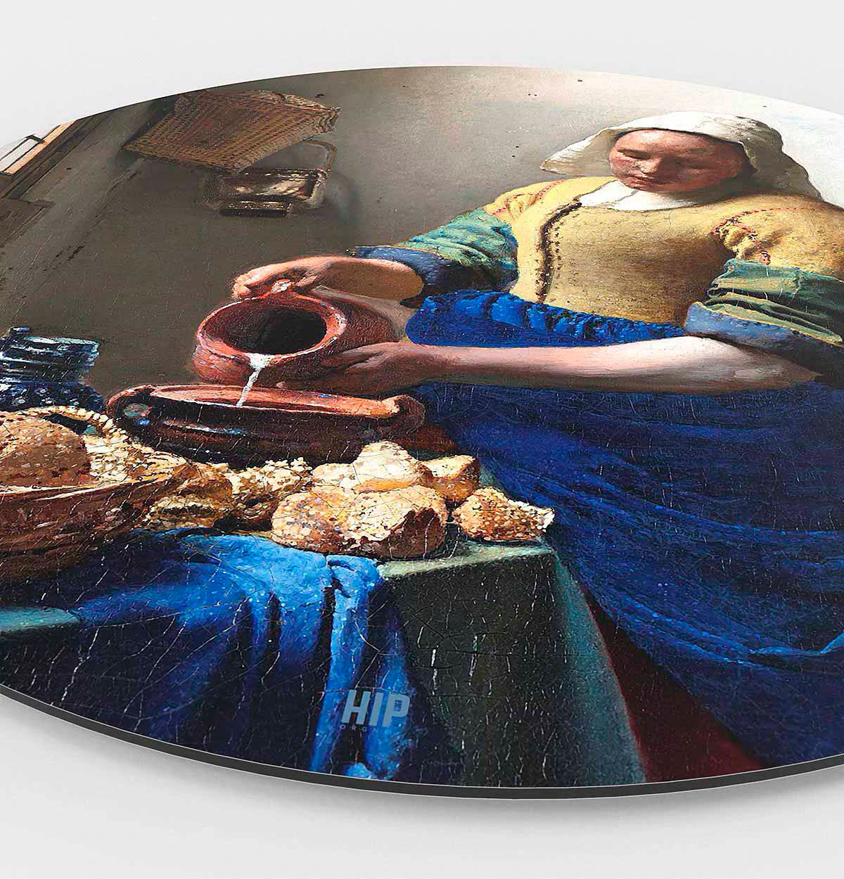 Het melkmeisje wanddecoratie met blauw en geel.