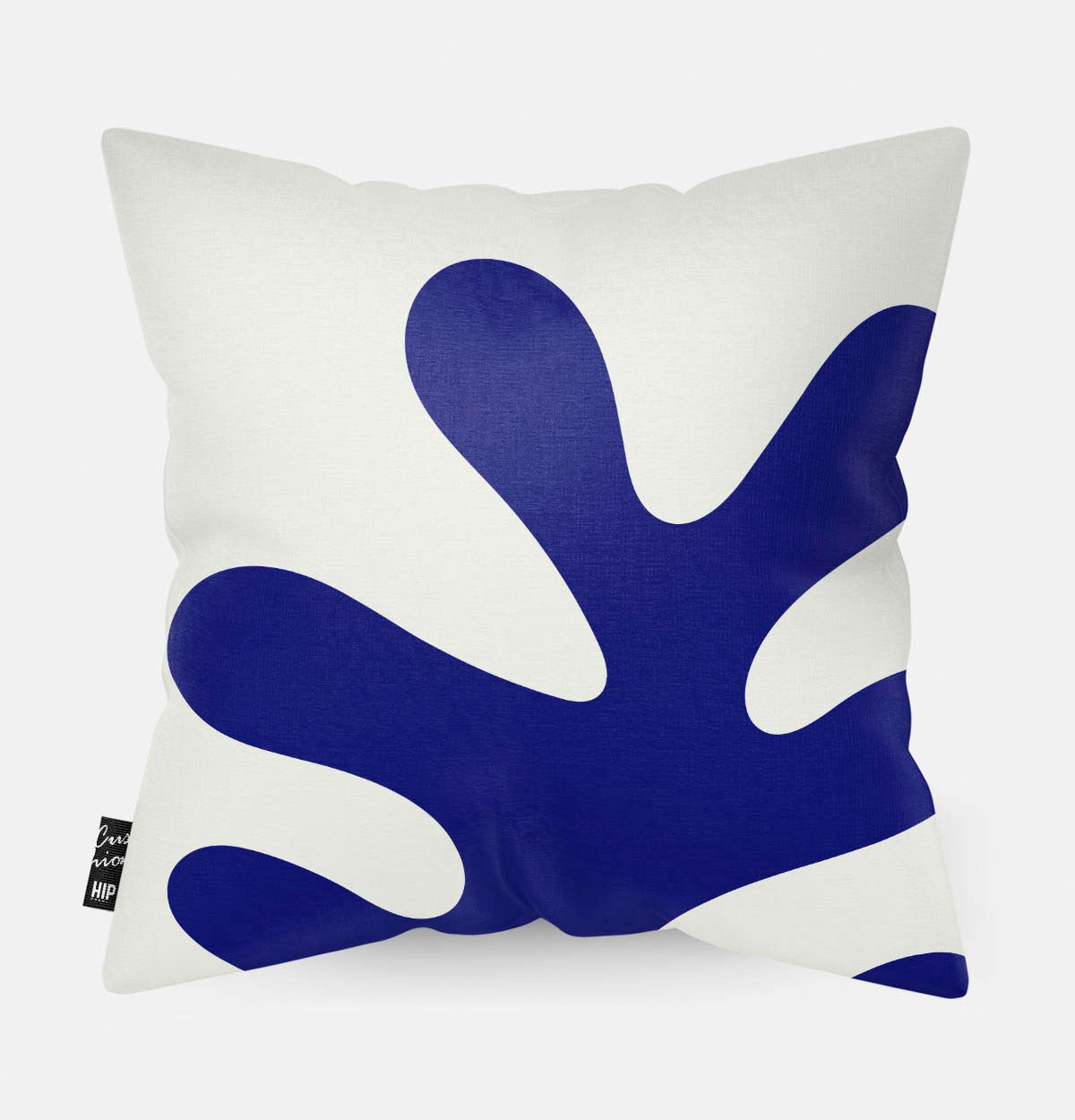 Kussen met line art met blauw koraal erop afgebeeld in abstracte vorm.