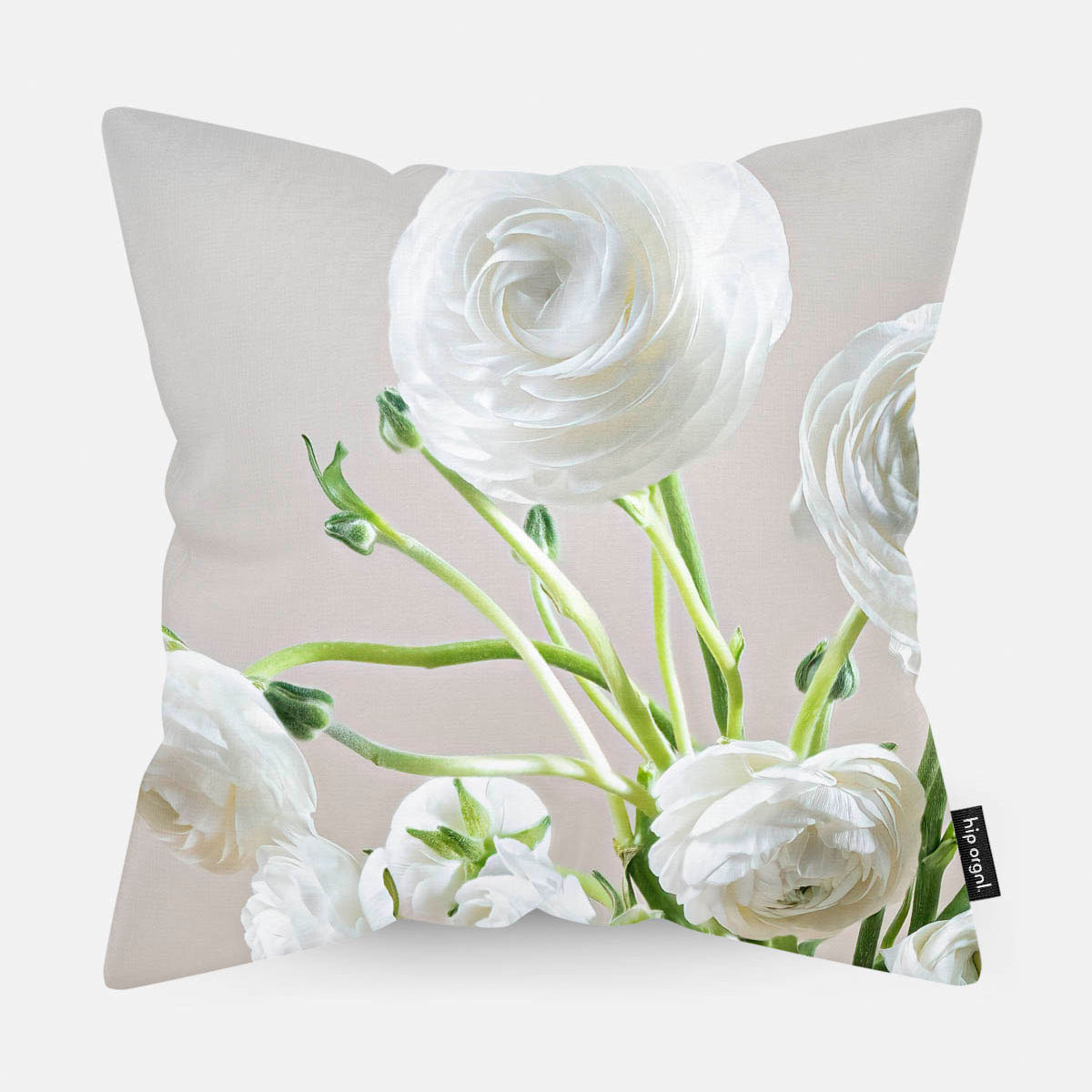 Sierkussen met witte bloemen met een lichte achtergrond