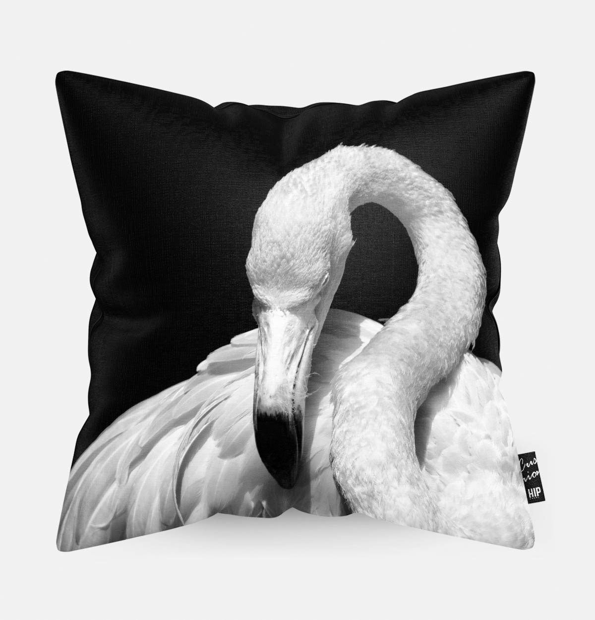 Kussen met een flamingo in zwart-wit erop afgebeeld.