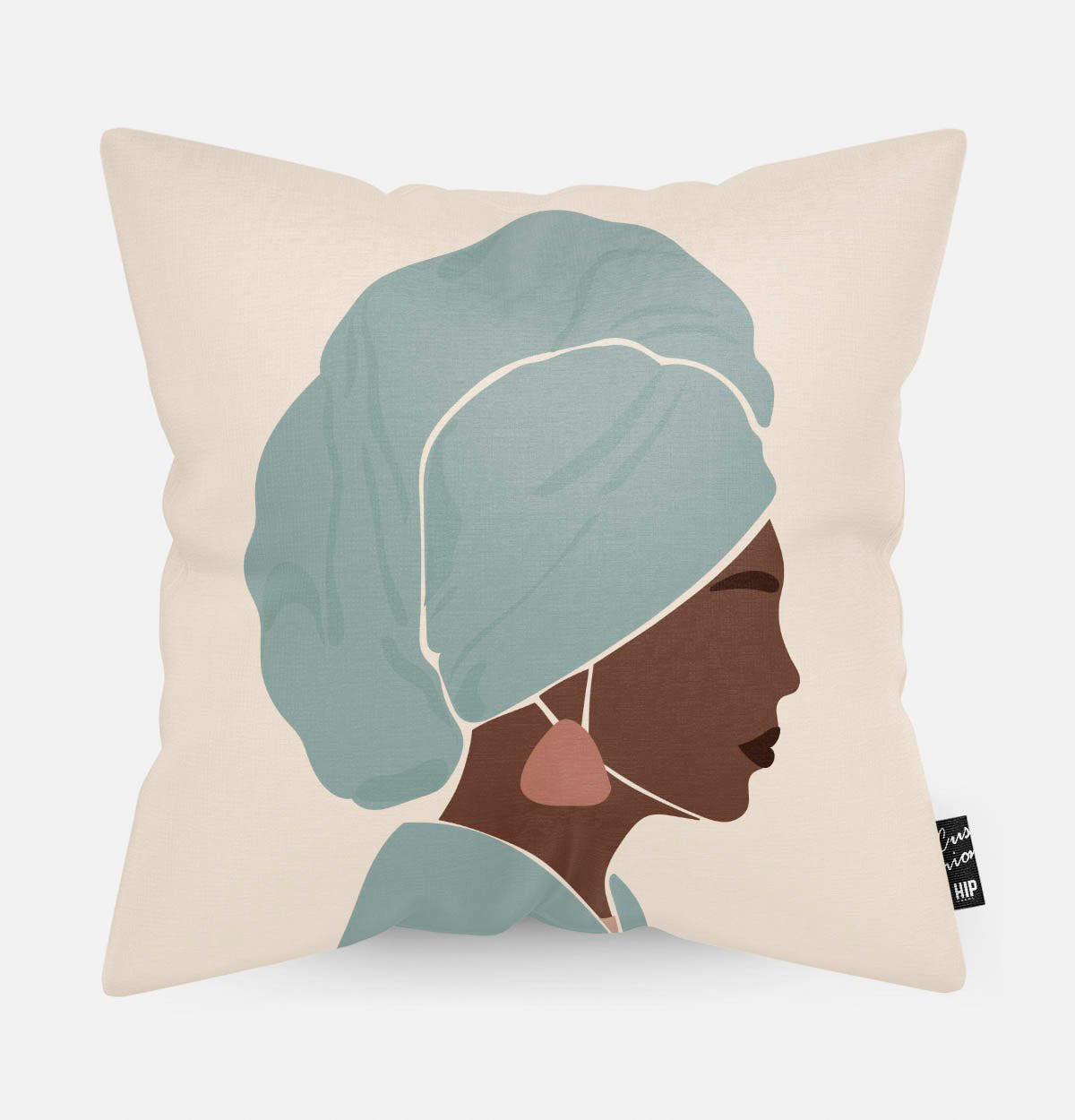 Kussen met line art met Afrikaanse vrouw met een tulband erop afgebeeld.